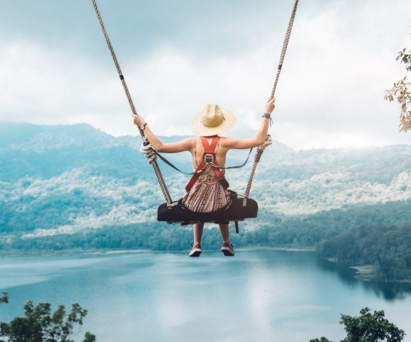 beautiful-girl-enjoying-freedom-on-swing-in-bali-indonesia-e1649177253711-pmxd9jlr7ioe5f04aed956x1xl9o3lov92o00m4xoo
